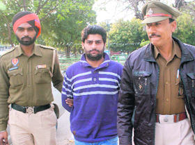 Rahul, alias Ricky, an accused in the extortion bid case, in police custody in Mohali on Friday
