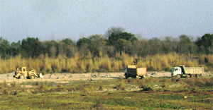 Illegal mining being carried out in the Swan rivulet in Una district.
