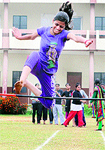 A student of St Soldier College, Basti Danishmandan, participates in the high jump event during the 12th annual sports meet in Jalandhar on Friday