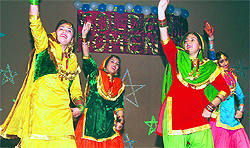 Hostlers of Kanya Maha Vidyalaya perform giddha during a farewell party organised in the college