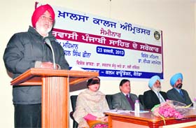Dr Sawraj Sandhu gives a lecture during a seminar at Khalsa College in Amritsar on Saturday