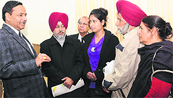 The District and Session's Judge counsels an NRI woman who filed for divorce during a lok adalat in Chandigarh on Saturday