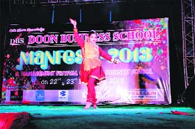 A student performs at Manfest 2013 in Dehradun on Saturday