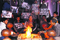 Activists of Dogra Front perform religious prayers to pay tributes to the victims of Hyderabad twin blasts, in Jammu on Saturday. They have demanded strict action against sympathisers of terror outfits