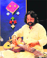 Ajay P Jha plays the Mohan Veena at the Vasant Ustav in Jalandhar on Saturday.