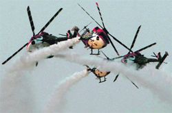 IAFs Sarang helicopters during an Iron Fist 2013 military exercise in Pokhran near Jaisalmer on Friday. PTI
