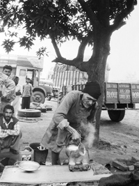 Lal Singh Dil serving tea at his tea shop, where writers converged, in Samrala. Photo: Diwan Manna