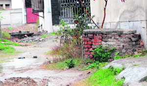 Septic tanks established outside houses in an illegal locality in Amritsar. 