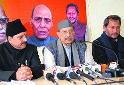 Former state Chief Minister BC Khanduri addresses a press conference in Dehradun on Sunday. Also seen in the photo are Leader of the Opposition Ajay Bhatt and state BJP chief Teerath Singh Rawat.