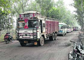 Traffic moves at a snails pace on the national highway No 73 in the Yamunanagar-Panchkula stretch, thanks to its deplorable condition