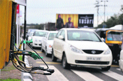 Power lines hang loose while the authorities choose to look the other way. Tribune photo: Anand Sharma