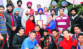 The students of Department of Computer Science and IT after lifting the overall trophy during the annual sports meet held at Lyallpur Khalsa College in Jalandhar.