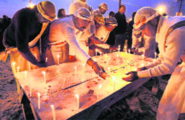 Priests pay homage to Hyderabad blast victims in Allahabad on Sunday.