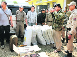 Police with seized illegal drugs at Pallel in Manipurs Chandel district on Sunday. 