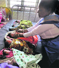 A nurse administers polio drops to newly born babies at a government hospital in Agartala on Sunday. 