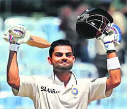Virat Kohlis century (107) keeps his momentum going in Tests. 