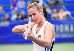New Zealands Marina Erakovic poses with her guitar-shaped trophy after winning the U.S. National Indoor Championships on Saturday.