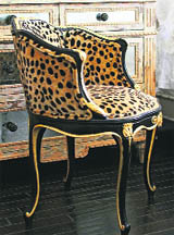 Use animal prints to accent pieces in a room