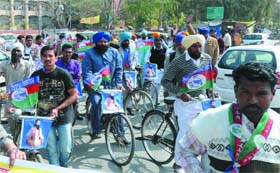 State president of the Lok Janshakti Party, Kiranjit Gehri, along with party workers carries out a cycle rally on the occasion of Guru Ravidas Jayanti in Bathinda on Monday