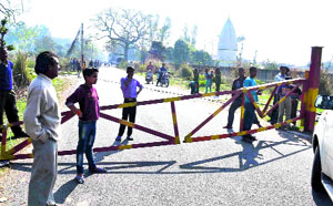 The broken railway barrier at BHEL township in Haridwar on Monday.