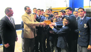The Pratap section of the RIMC receives the Inter-Section Variety Entertainment Trophy in Dehradun on Monday. 