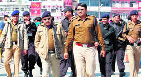 In view of the Kanwar yatra, SP (city) Kiran Lal Shah with ASP Ajay Singh take a round to the Ganga ghat at Har-ki-Pauri in Haridwar on Monday.