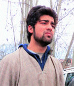 Javid Wanis son Tabsih outside his house in Kalantara Payeen, Baramulla, on Monday. 