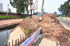 Silt on a roadside in Jammu on Monday. 