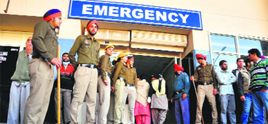 Policemen deployed outside the hospital. 