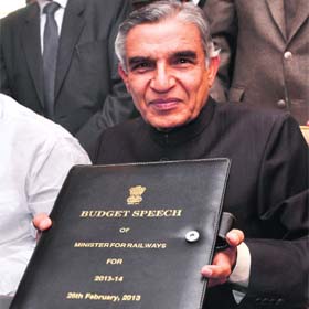 Railway Minister Pawan Kumar Bansal holds the this years Railway Budget in New Delhi on Monday