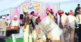 Policemen outside the Namdhari Shaheedi Smarak in Amritsar on Monday