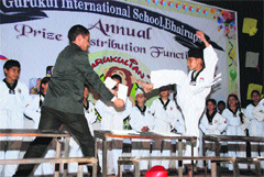 A child shows his skill in martial art at the annual function of Gurukul International School, Bhai Rupa. A Tribune photograph