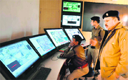 SP (city) KL Shah inspects the CCTV cell control room at CCR Towers in Haridwar on Tuesday. Tribune photo: Rameshwar Gaur