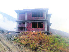 The yatri niwas under construction at Bharmour tribal township.