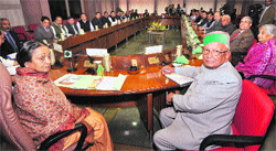 Meira Kumar (left) with Brij Bihari Lal Butail at the inauguration programme for newly elected MLAs at the Parliament Library in New Delhi on Tuesday. 