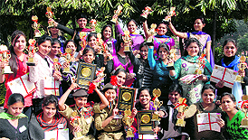 Students of Kanya Maha Vidyalaya in a jubilant mood after the annual prize distribution function in Jalandhar on Tuesday