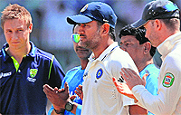 Man-of-the-Match MS Dhoni and his Australian skipper Michael Clarke during the presentation ceremony on Tuesday. India won the match by 8 wickets