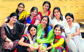 Meera Dass (in green dupatta) along with her team