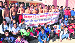 Wrestlers staging a protest against the decision of the International Olympics Committee, at Faridkot on Wednesday. A Tribune photograph