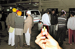A man shows a bullet