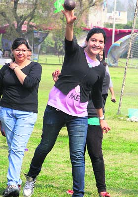 Students of Lyallpur Khalsa College participate in shotput event during the annual athletic meet in Jalandhar on Wednesday