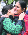 The wailing relatives of Parampreet Kaur in Patiala; and (below) Jaspal Singh Pardhan. 