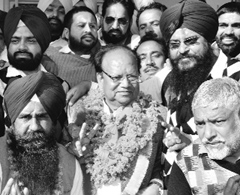 SAD candidate Joginder Pal Jain flashes victory