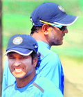 Sachin Tendulkar, skipper MS Dhoni train ahead of the second Test match in Hyderabad on Saturday.  PTI