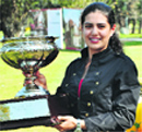 Tavleen strikes a pose with the Trophy.  Tribune photo