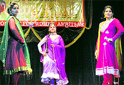Students of the Khalsa College for Women walk the ramp during the annual dress designing and costume show, Dressed to Impress, in Amritsar on Friday