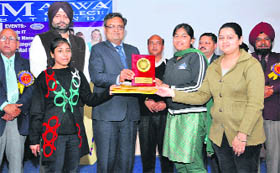 Winners receive their prizes at the Tech-Fest-2013 held at Malwa College on Friday.