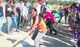 A girl grimaces as she takes part in the tug-of-war contest during the athletic meet at Baba Farid College of Engineering and Technology on Friday.