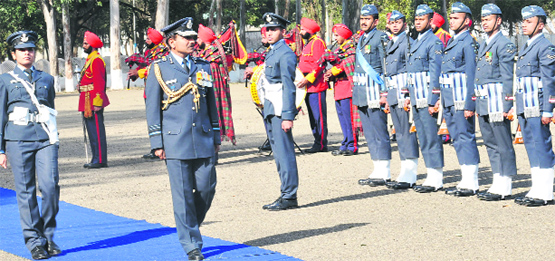 Air Officer Commanding-in-Chief of the western command Air Marshal Arup Raha takes a guard of honour during his visit to the High Grounds in Chandigarh on Friday. A Tribune photograph