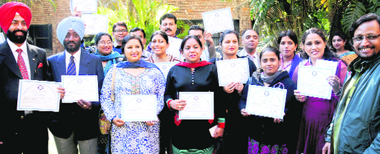 Census functionaries with their certificates at CRRID, Sector 19, Chandigarh, on Friday.